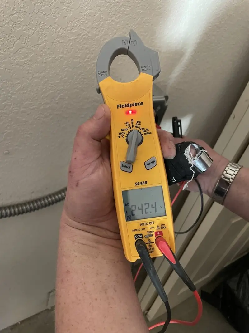Voltage testing with clamp meter during Generator Installation in Santee